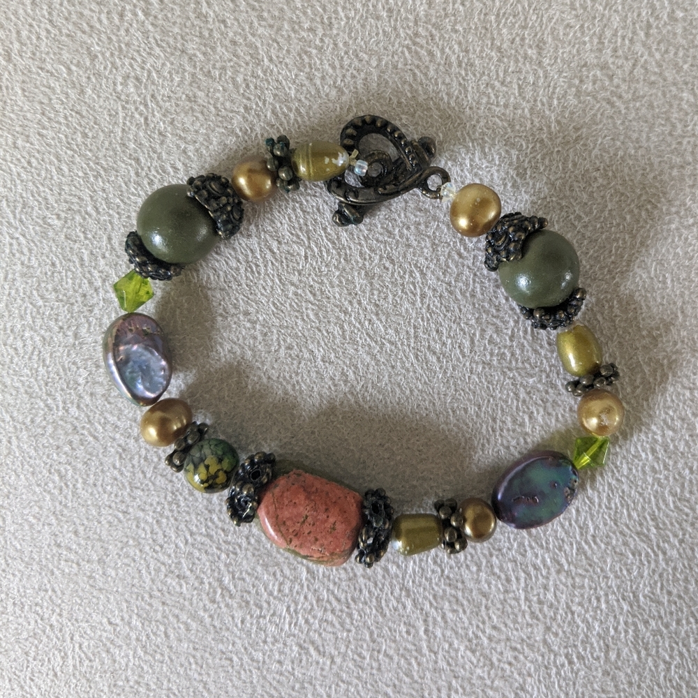 Multi color stone bracelet with heart lock